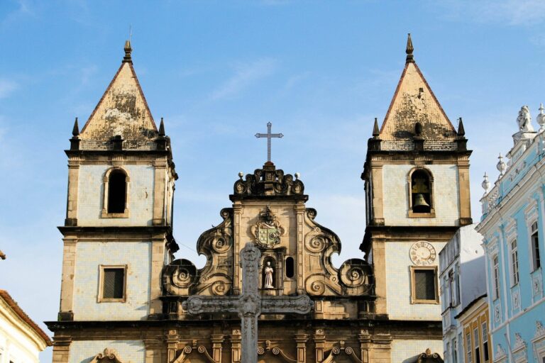 a church with a cross on its facade