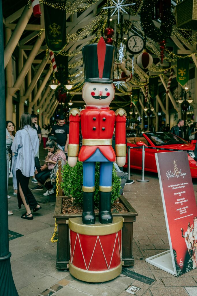 A giant nutcracker figure among Christmas decorations in Gramado, by Katalin Salles