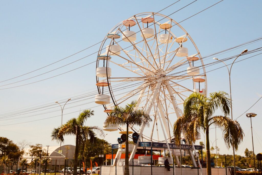 Street scene in Macap&aacute; with a Ferris wheel, by Cassio Magno