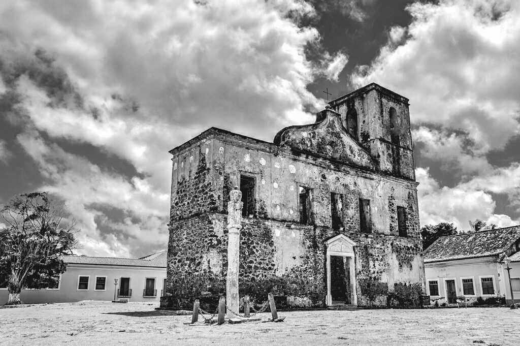 The ruined Igreja Matriz de S&atilde;o Matias with the colonial pillory in front, Alc&acirc;ntara, in black and white