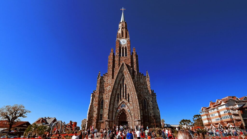 The Catedral de Pedra in Canela against a blue sky, by Vladimir Soares