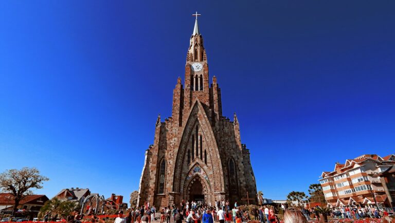 The Catedral de Pedra in Canela against a blue sky, by Vladimir Soares