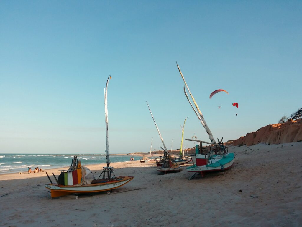 Jangada rafts on the beach at Canoa Quebrada, by Gilberto Olimpio