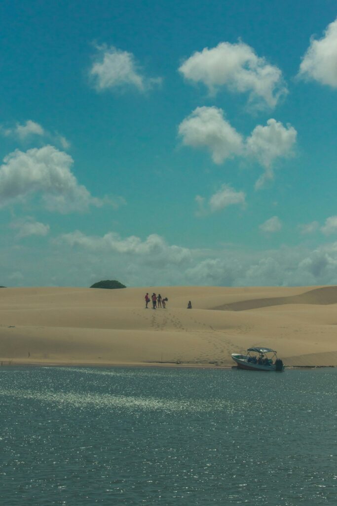 Boat moored beside sand dunes near Parna&iacute;ba, Piau&iacute;, by Javier Collarte