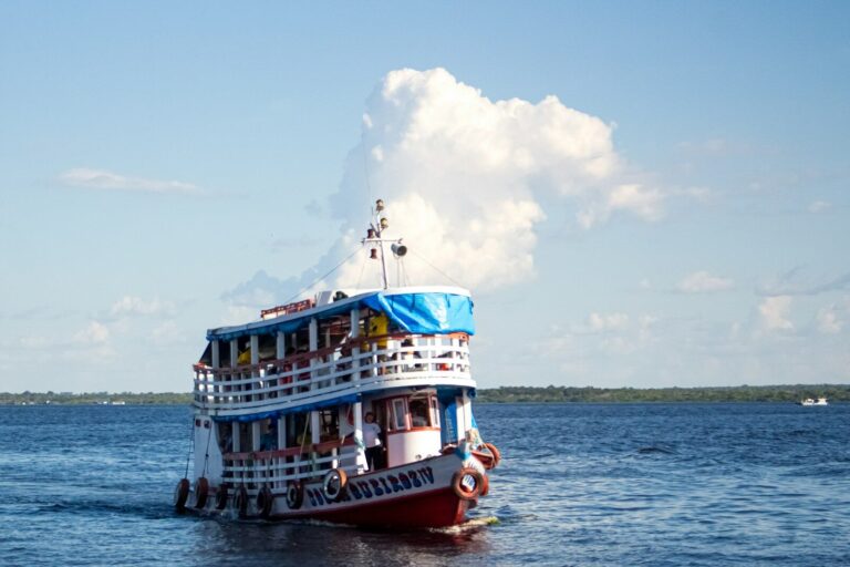 A passenger riverboat on the wide brown water of the Amazon near Belem